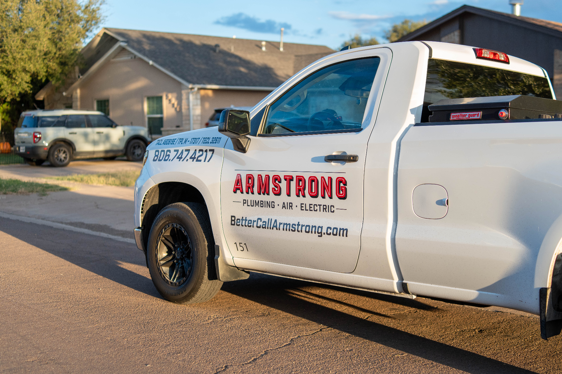 Armstrong service truck at residential home